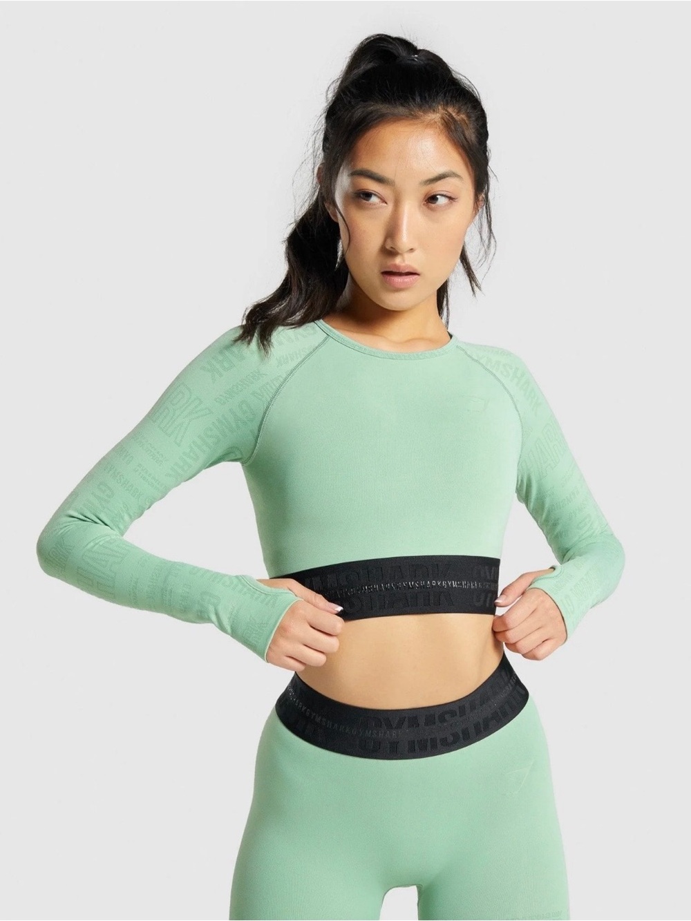 Gymshark Mint Green Long Sleeve Seamless Crop Top with Black Elastic Hem